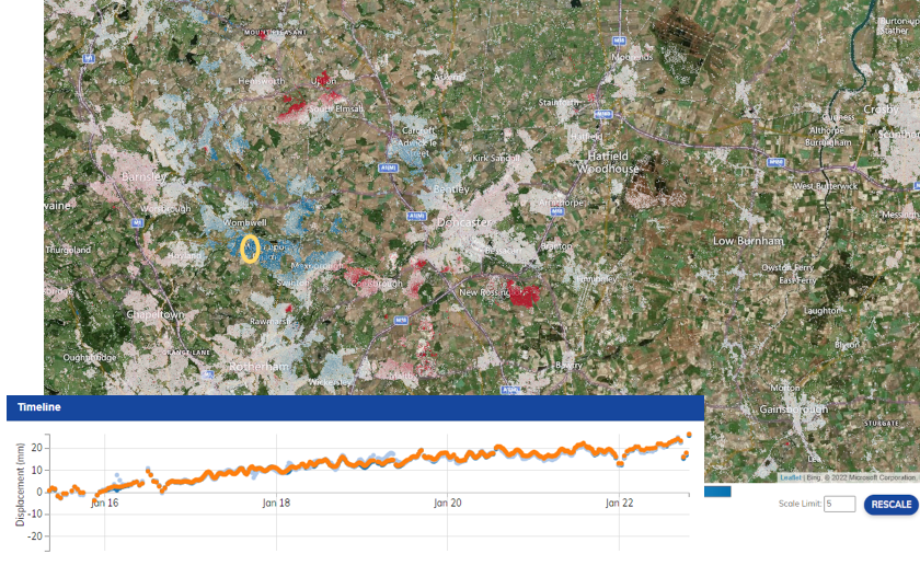 Map showing a large area in England for subsidence and heave using InSAR data, along with a graph which shows upward movement of ground near wombwell