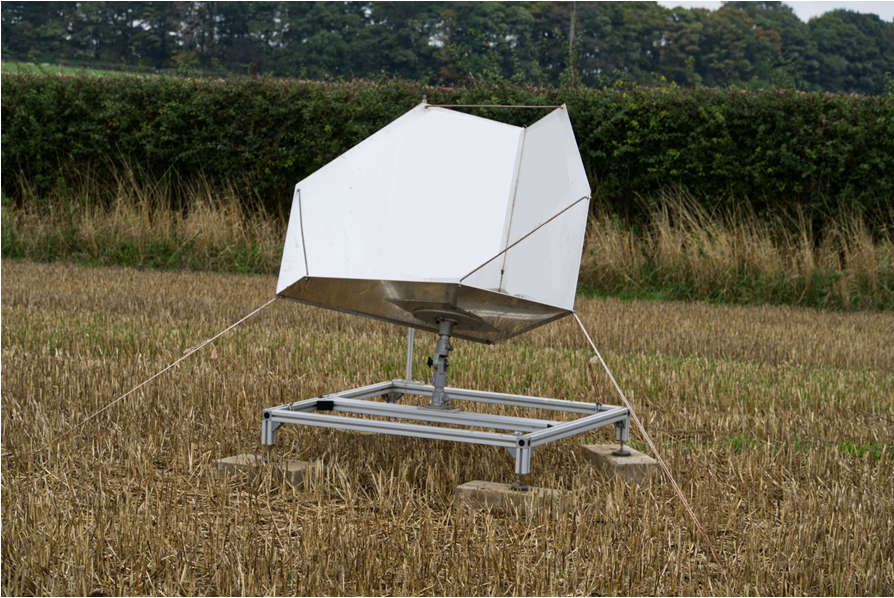 Corner reflector on a vegetative site for enhanced InSAR coverage