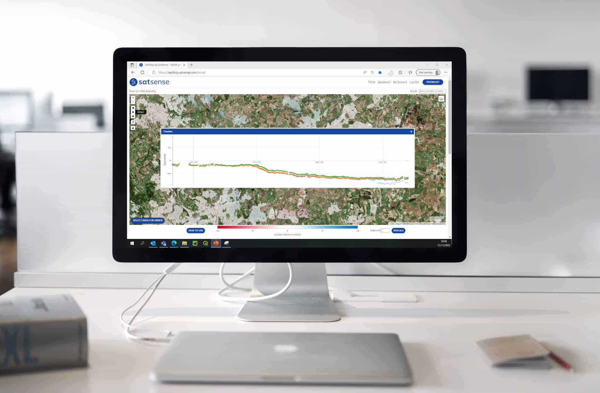 SatShop portal showing ground displacement with a downward-moving graph