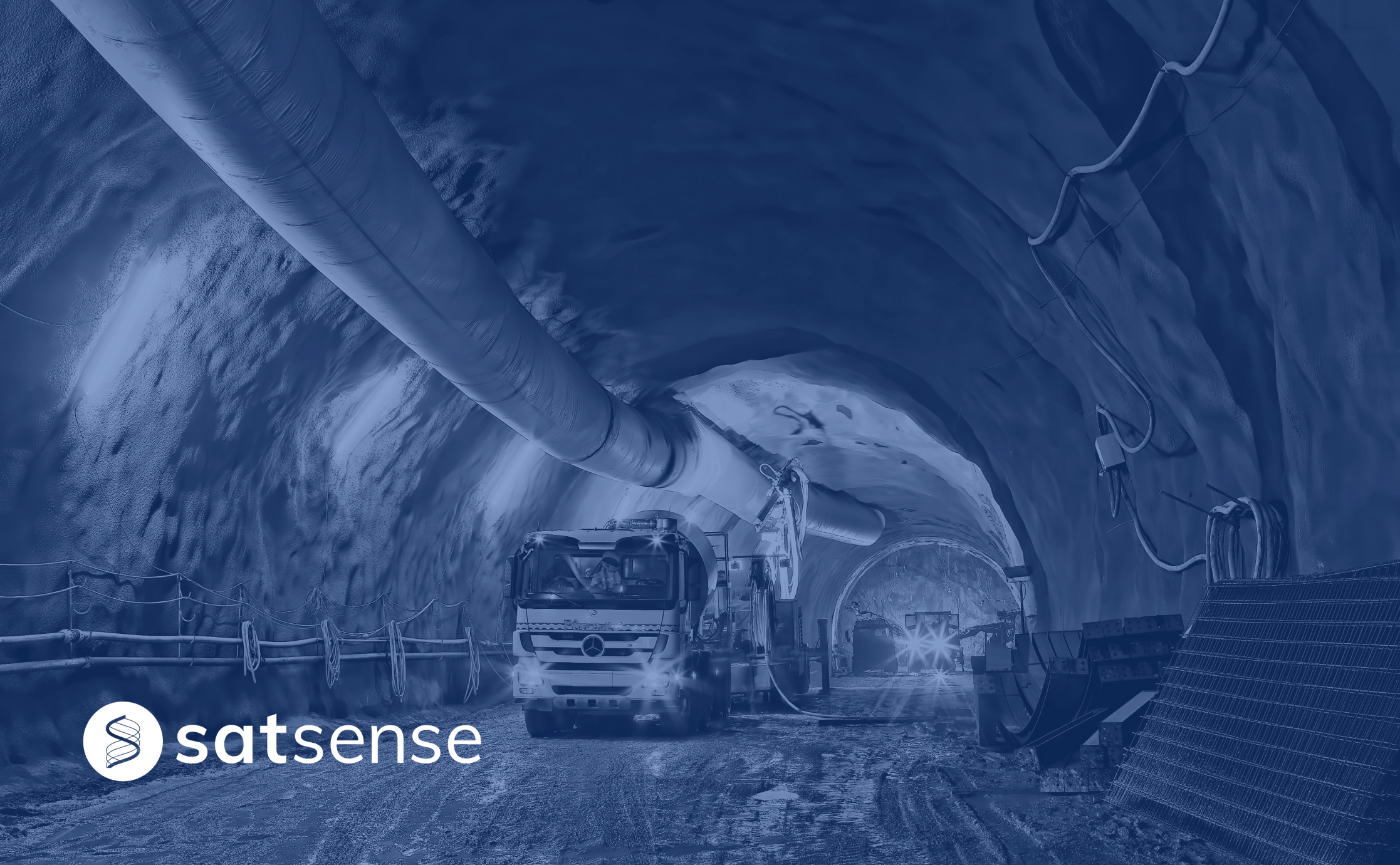 Tunnel at a mining site with SatSense logo on the bottom left corner